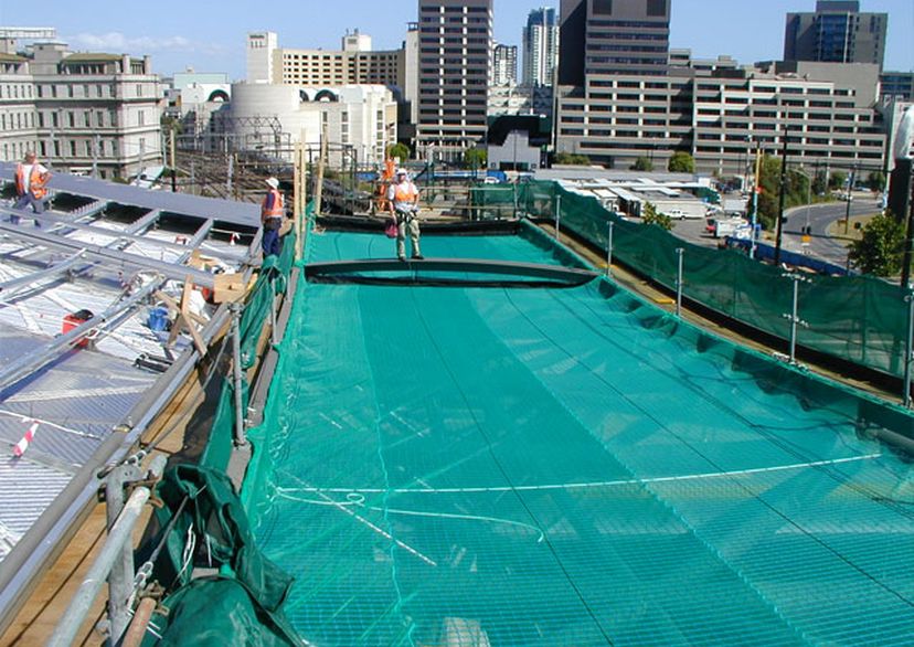 Blue safety net with debris overlay