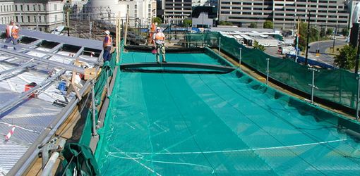 Blue safety net with debris overlay